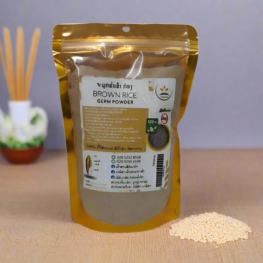 A package of Brown Rice Germ Powder, 1kg, with a golden resealable bag and some rice grains scattered in front.