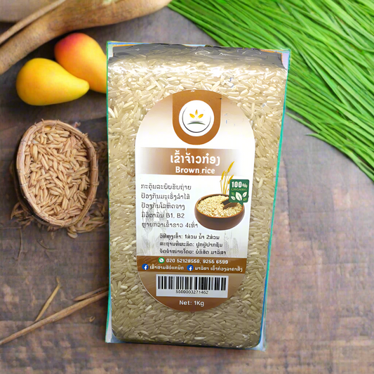 A package of Brown Rice weighing 1kg, made in Laos and labeled as 100% Organic. The packaging is predominantly white with some text in a foreign language and an image of the rice grains in a bowl.
