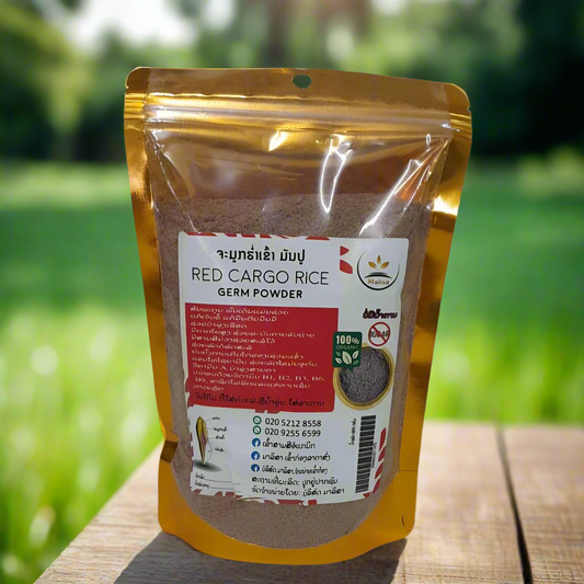 Product shot of a 600g pouch of Lao Souvenir Red Cargo Rice Germ Powder on a white background. The packaging is white with red and gold accents, and features text highlighting "Premium Quality", "100% Organic", and "No Sugar".