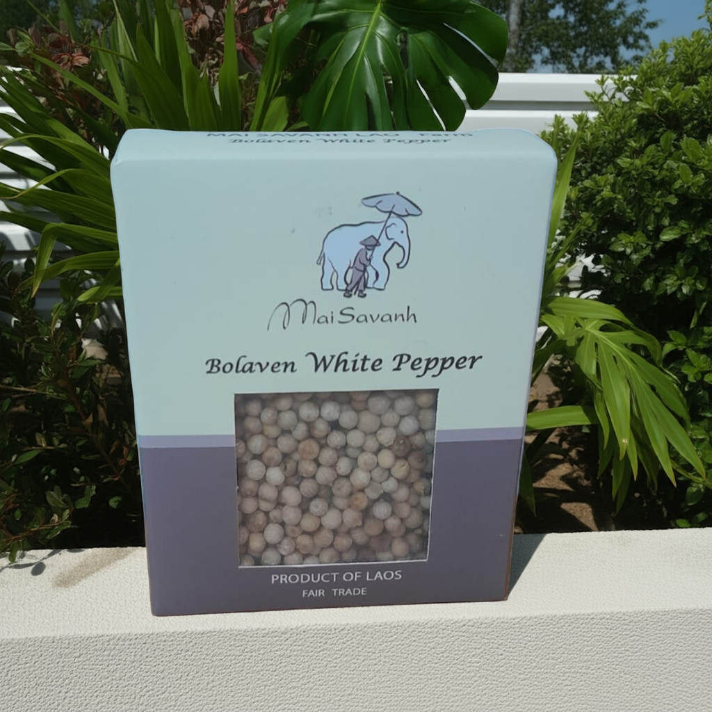 Mal Savanh Bolaven White Pepper packaging with an elephant illustration against a green leafy background